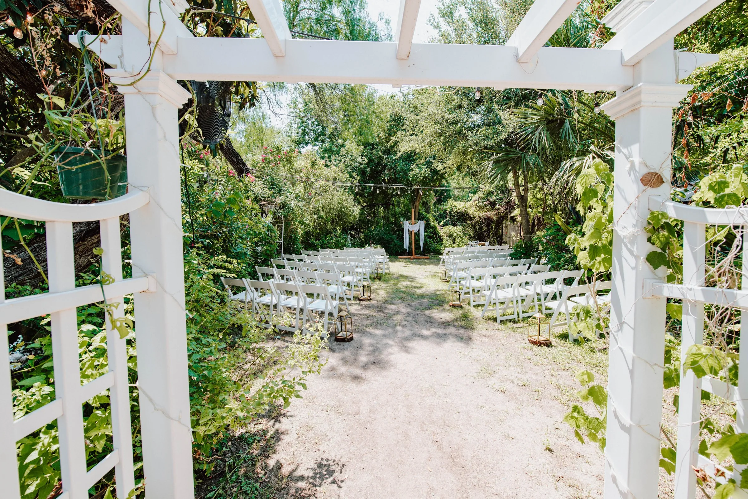 Outdoor ceremony aisle and arbor before the wedding